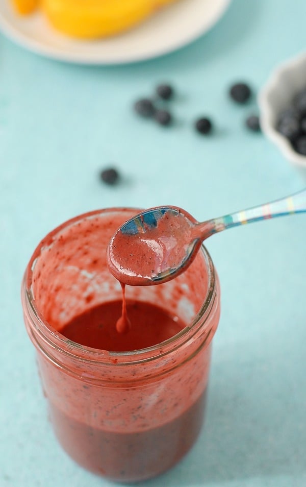 Blueberry-Guava Vinaigrette in a jar with spooon