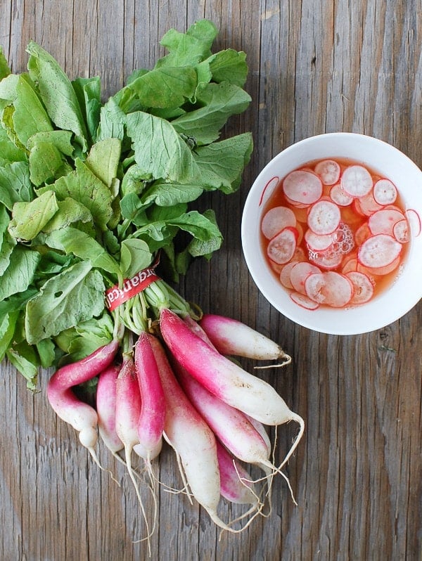 Food on a wooden table, with Radish and Salad