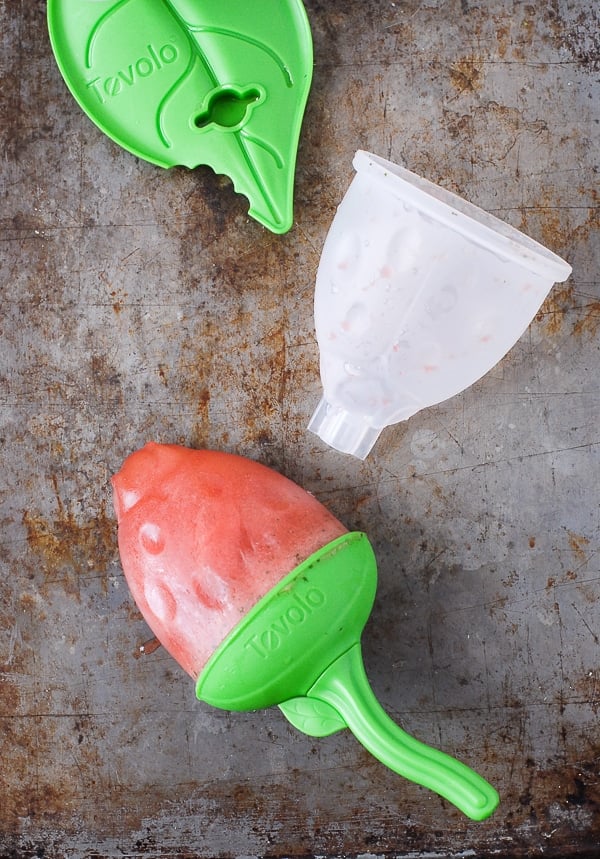 Watermelon Mint Bug Popsicles on metal sheet pan