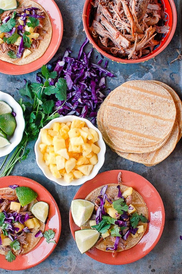 Three plates of slow cooker Tacos Al Pastor