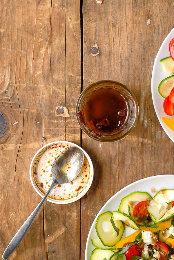 Sun-Dried Tomato Balsamic Vinaigrette dressing in a small jar