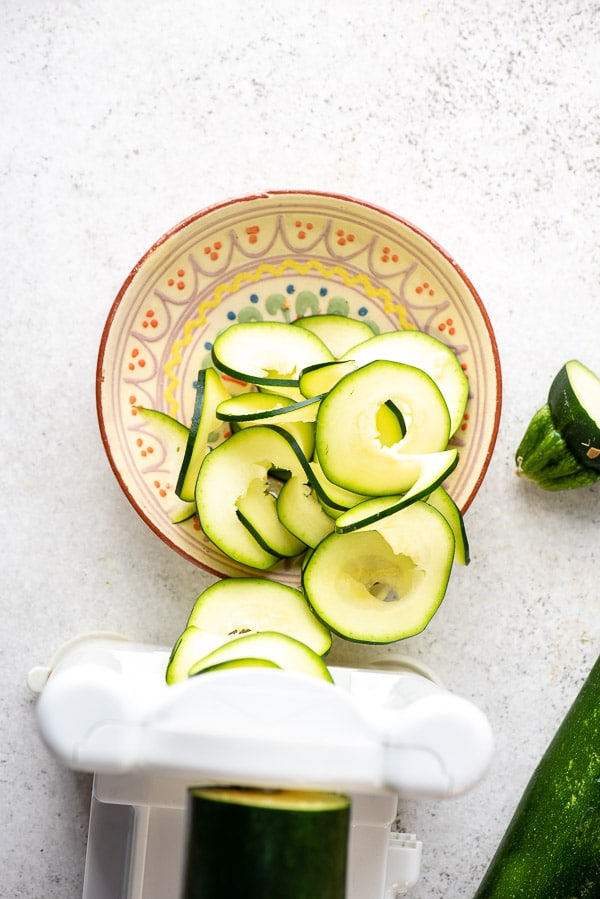 Mediterranean bowl with freshly spiralized zucchini ribbons