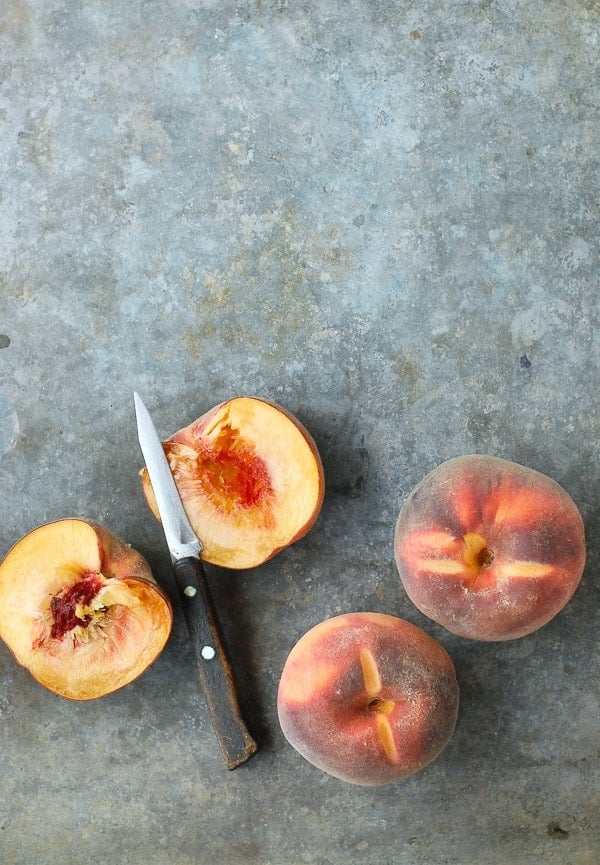 Fresh Peaches halved with knife