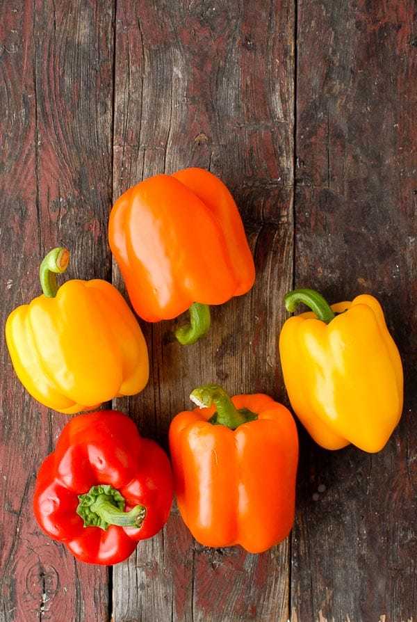 Fresh orange, red and yellow sweet bell peppers 