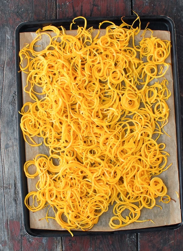 Butternut Squash Noodles on black baking sheet