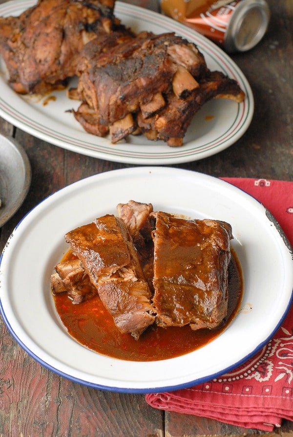 Slow Cooker Root Beer Baby Back Ribs on enamel plate