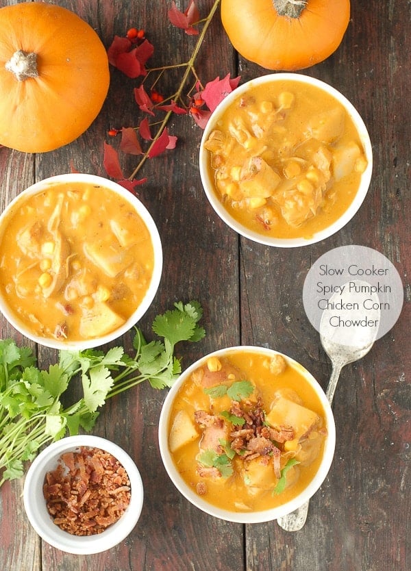 Slow Cooker Spicy Pumpkin Chicken Corn Chowder in white bowls