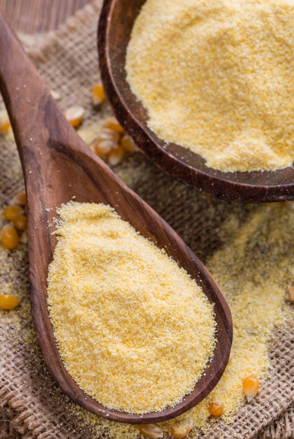 cornmeal in wooden spoon