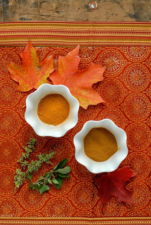 white bowls of turmeric and cinnamon for slow cooker beef stew