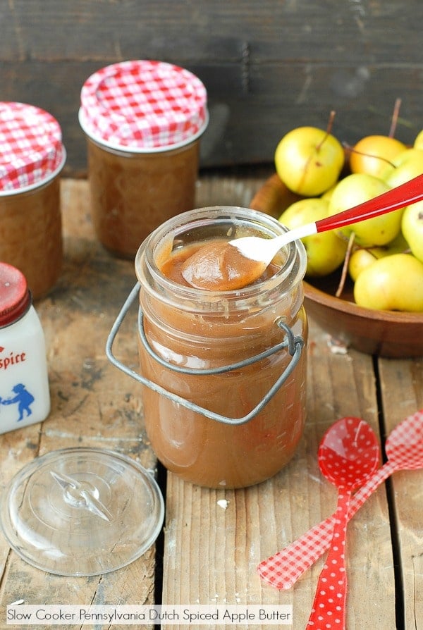 Slow Cooker Pennsylvania Dutch Spiced Apple Butter in jar with spoon