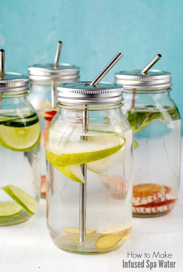 Mason jars of homemade Infused Spa Water with fruits, vegetables and herbs