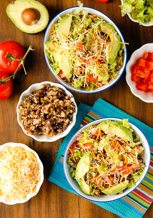 Turkey Black Bean Quinoa Burrito Bowls with grated Mexican cheese