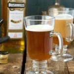 Authentic Irish Coffee recipe. Steaming hot sweetened coffee, Irish Whiskey and a cream float. Great after a big meal or to drink Irish for St. Patrick's Day without the Guinness! - BoulderLocavore.com