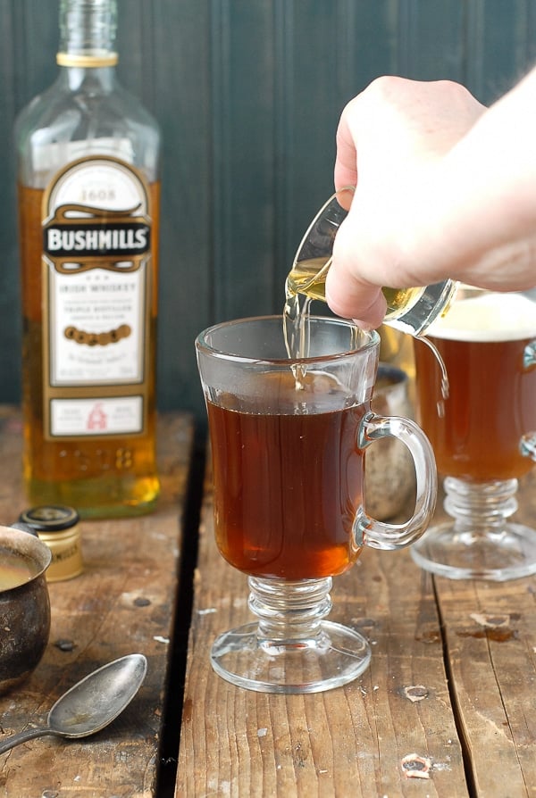 Authentic Irish Coffee recipe - pouring the Irish Whiskey