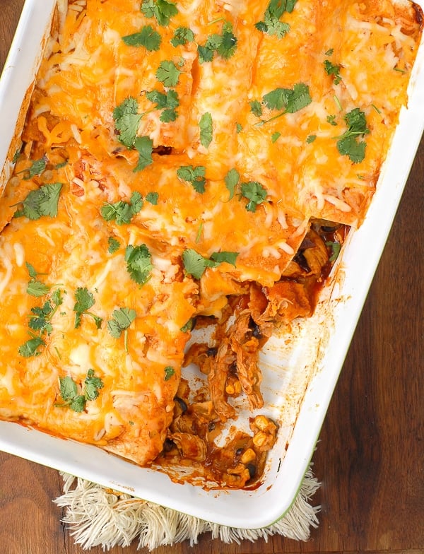 baking pan of Chipotle Green Chile Chicken and Black Bean Enchiladas 