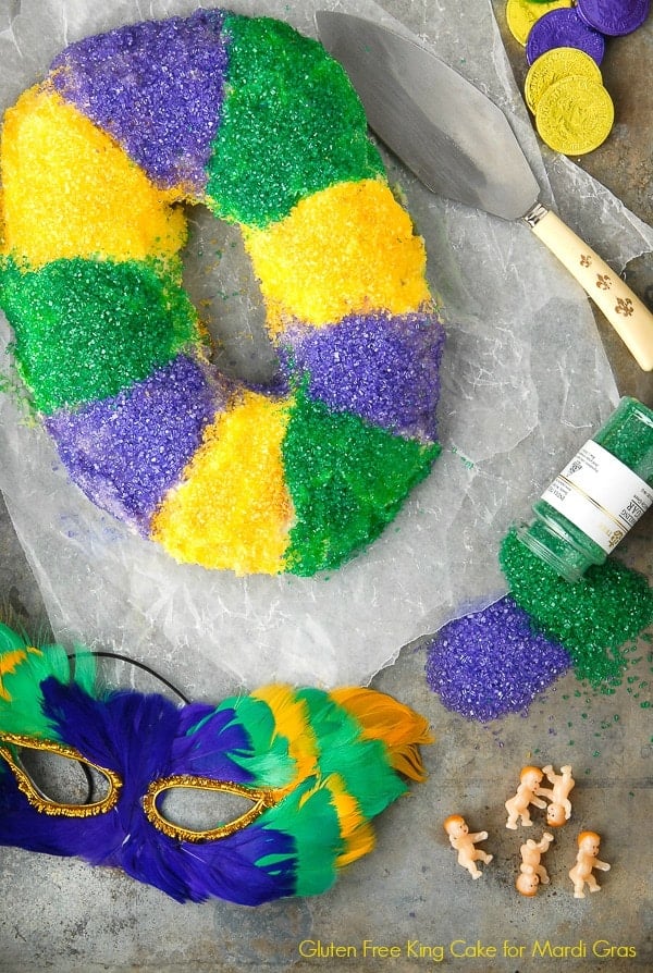 Mardi Gras King Cake with sprinkles and mask