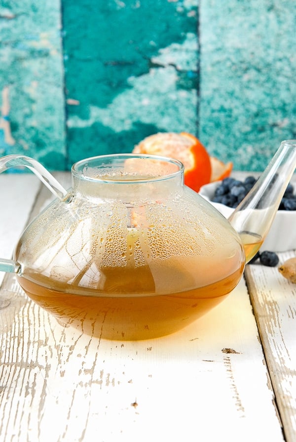 glass tea pot of green tea