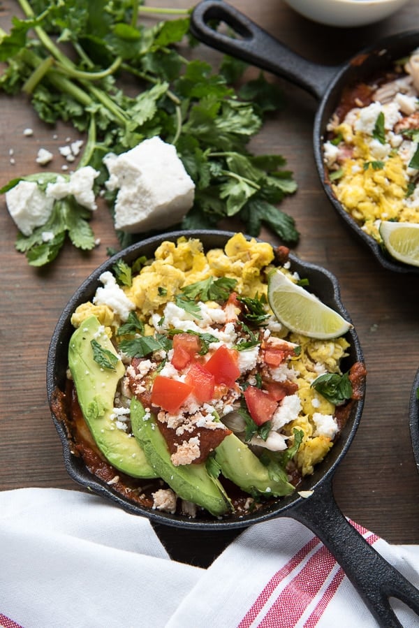 Spicy Chipotle Chicken Chilaquiles with avocado and cotija cheese