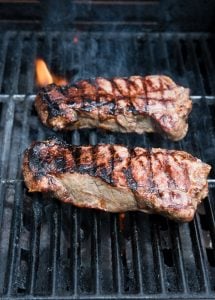 grill marks on new york strip steaks