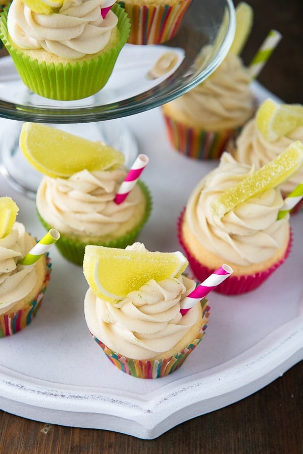 Shortcut Margarita Cupcakes with Cream Cheese Lime Frosting on a white tray