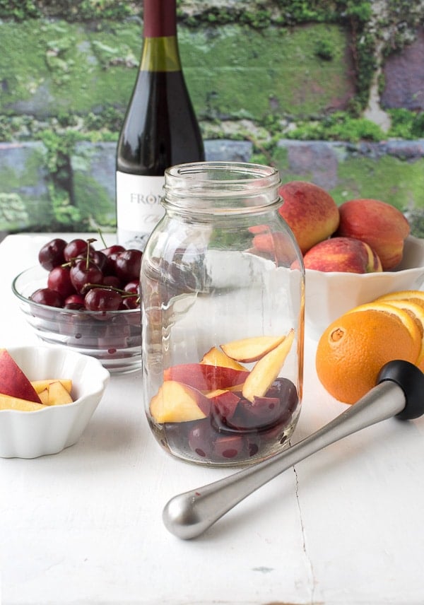 muddling cherries and peaches