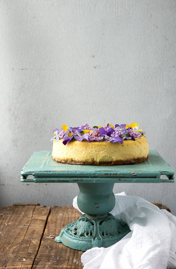 Lemon cheesecake with edible flowers