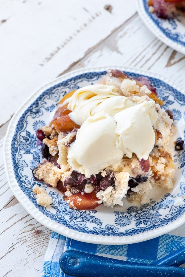 Serving of Peach Blueberry Cobbler with ice cream