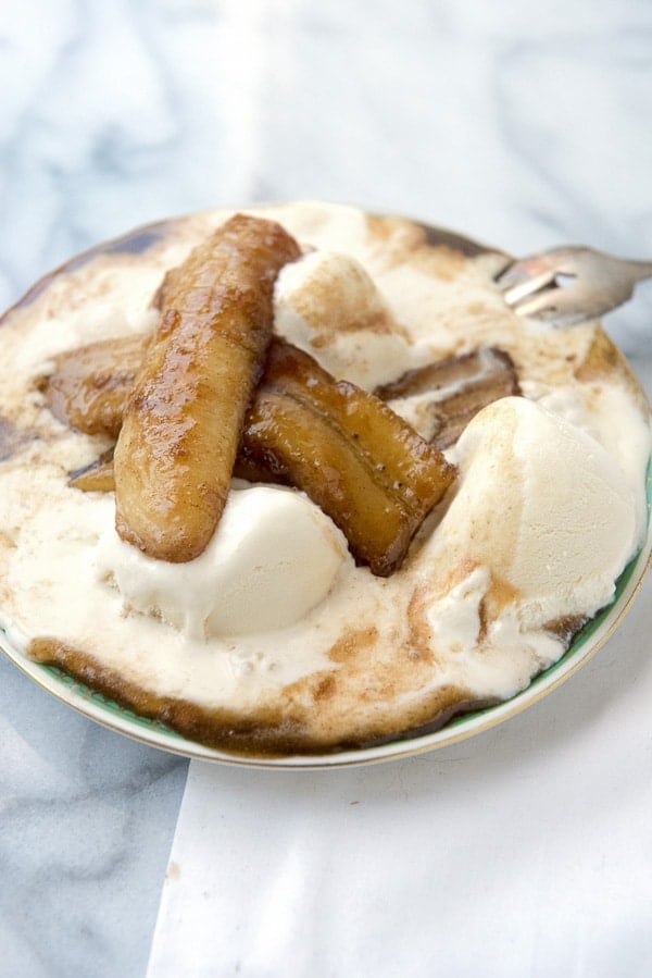 Classic Bananas Foster dessert. Bananas cooked in a buttery caramel sauce, flambeed in rum served ice cream