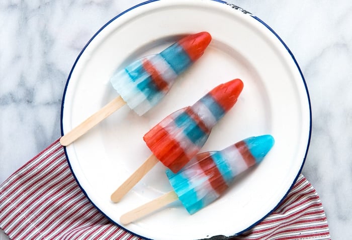 white enamel plate with red white and blue rocket popsicles