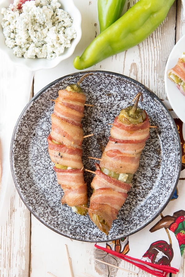 Smoked Blue Cheese Stuffed Bacon-Wrapped Chile Peppers on enamel plate