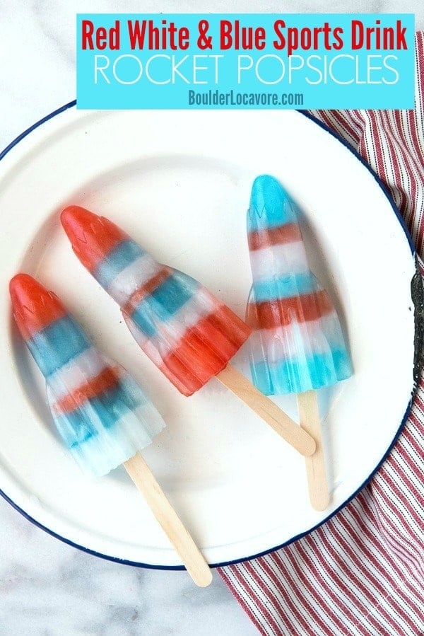 Red White and Blue Sports Drink Rocket Popsicles are a thirst-quenching summer treat perfect for 4th of July. A fun popsicle recipe to make. No two are the same! #popsicle #summer #4thofJuly #RedWhiteBlue #rocketpopsicles