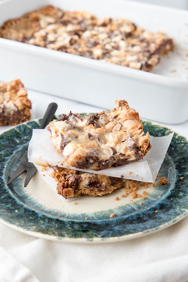 Mermaid Bait Bars stacked with parchment paper on a green plate