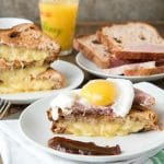 A plate of food on a table, with Egg and Cheese