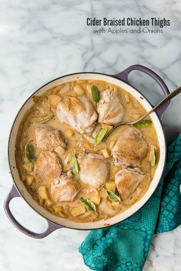 Cider Braised Chicken Thighs with Apples and Onions with fresh sage