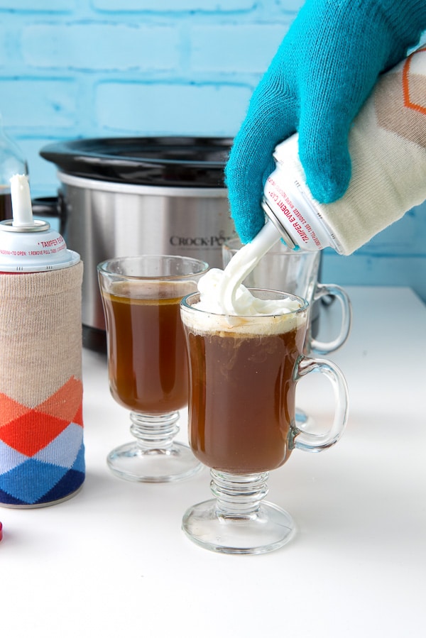 Slow Cooker Hot Buttered Rum with whipped cream 