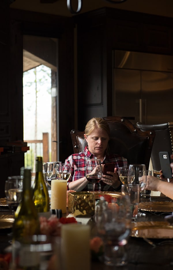 person testing at dining table