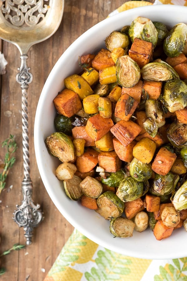 Herb Roasted Garlic Brussels Sprouts Sweet Potatoes and Carrots close up