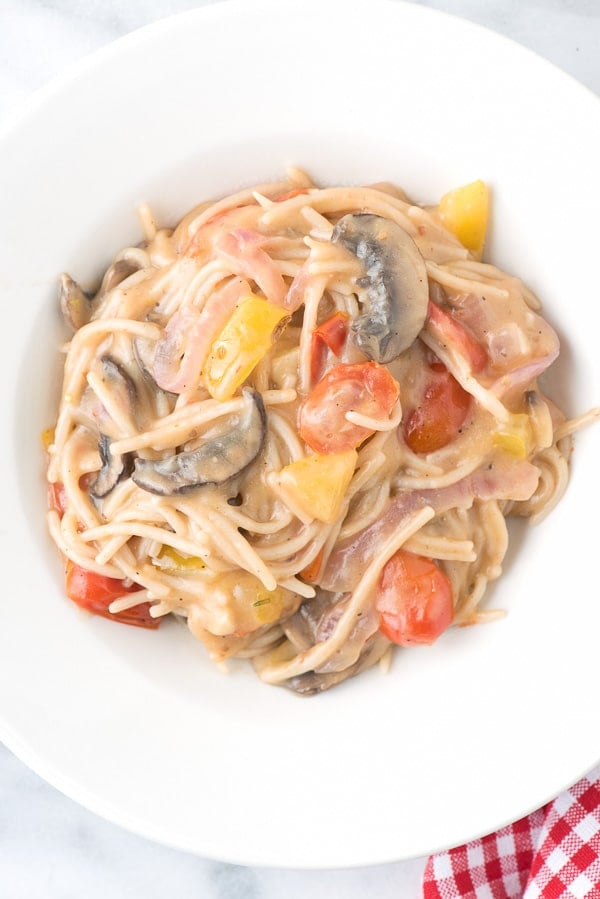 creamy bowl of Spicy One Pot Gluten-Free Tomato Mushroom Basil Pasta