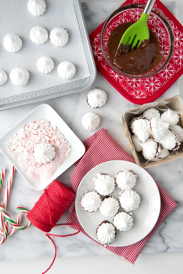 Meringue Cookies dipped in chocolate and peppermint candy canes