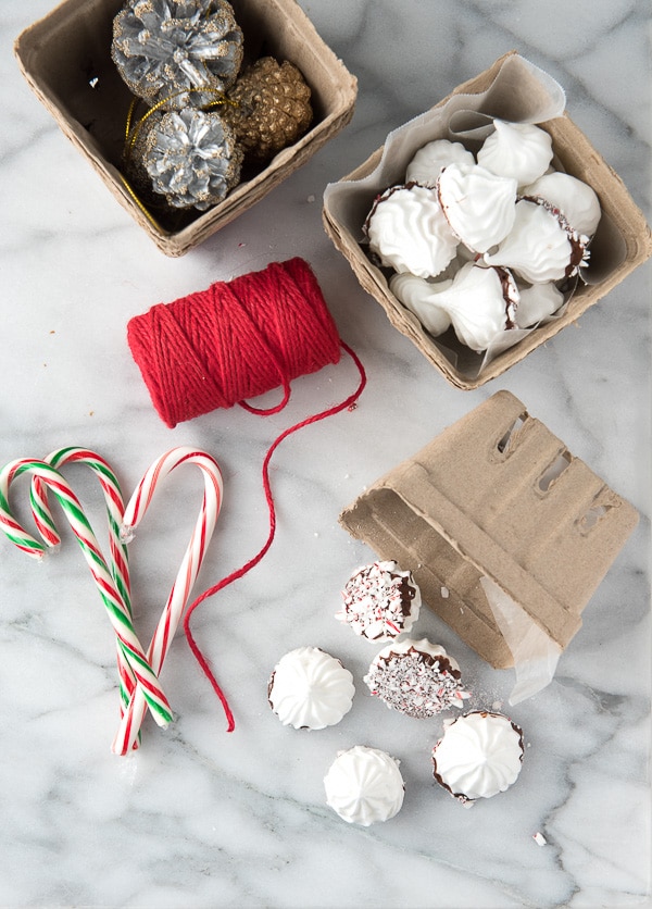 Chocolate Peppermint Dipped Meringue Cookies with gift wrapping supplies