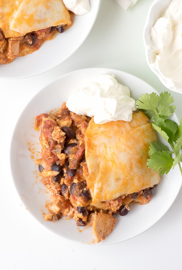 Mexican Breakfast Chicken Tortilla Lasagna Casserole with sour cream