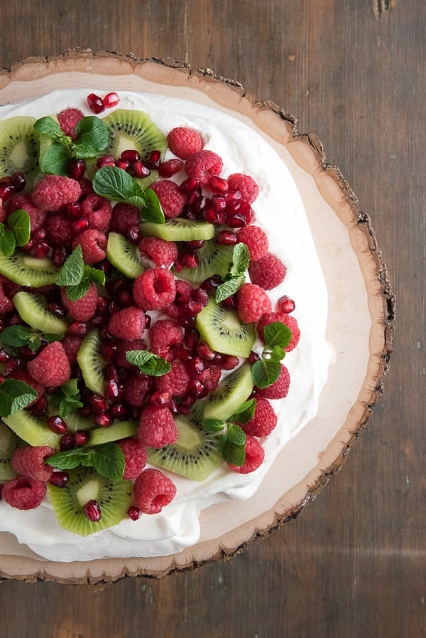 Pavlova with Kiwi, Raspberry, Pomegranate and Mint from above