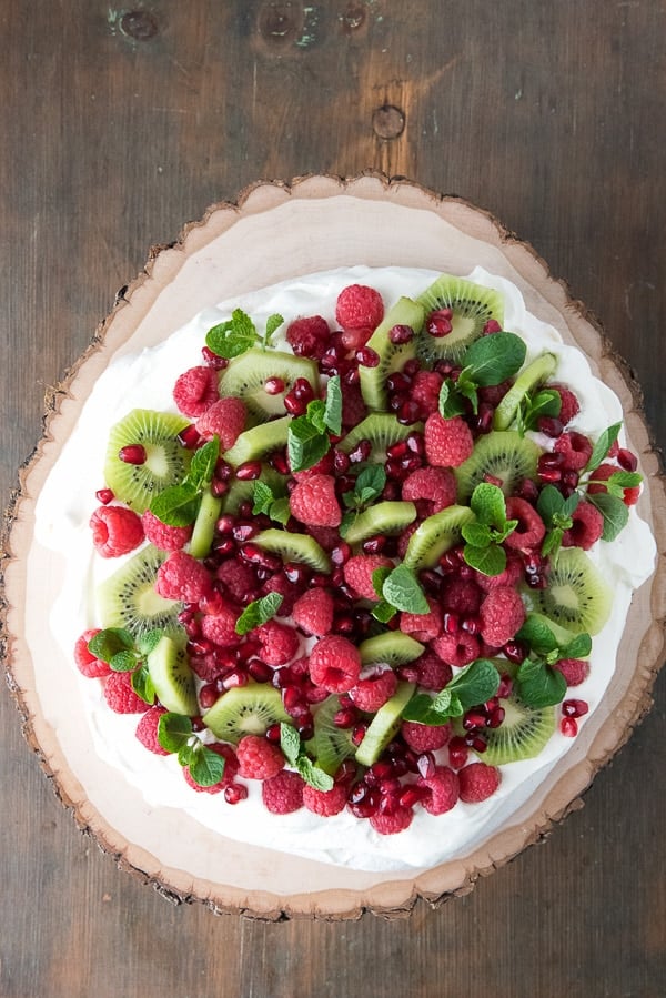 Pavlova with Kiwi, Raspberry, Pomegranate and Mint 