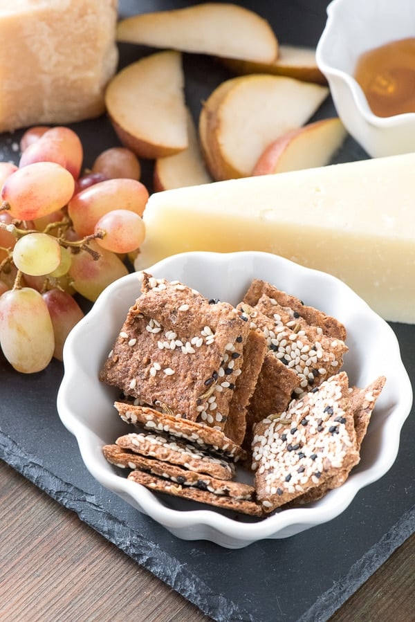 Seeded gluten-free crackers, Parmigiano-Reggiano cheese, grapes, Seckel pears and honey