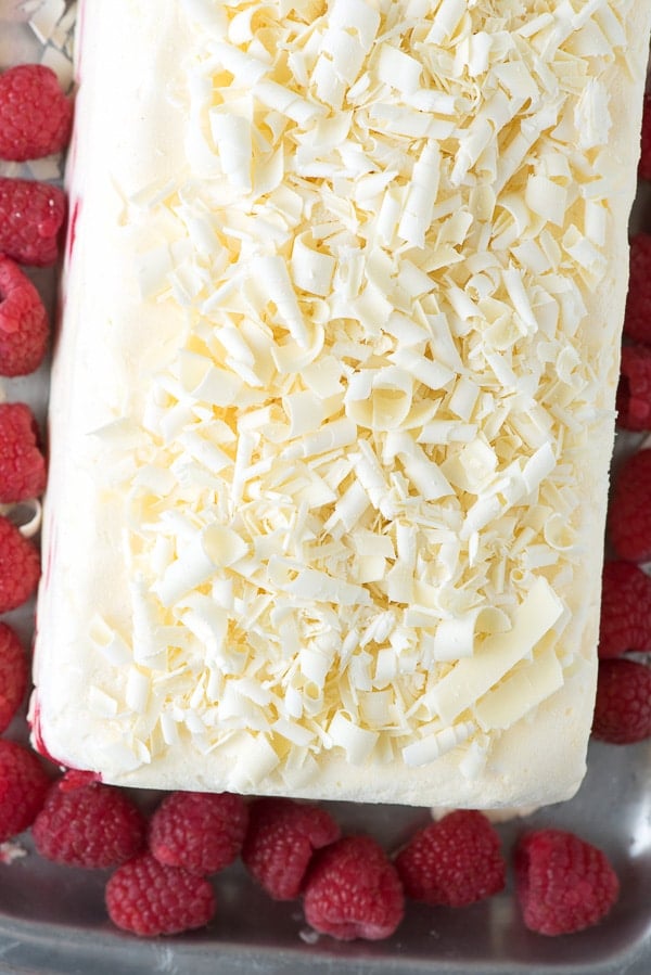 White Chocolate Raspberry Semifreddo from above with white chocolate curls