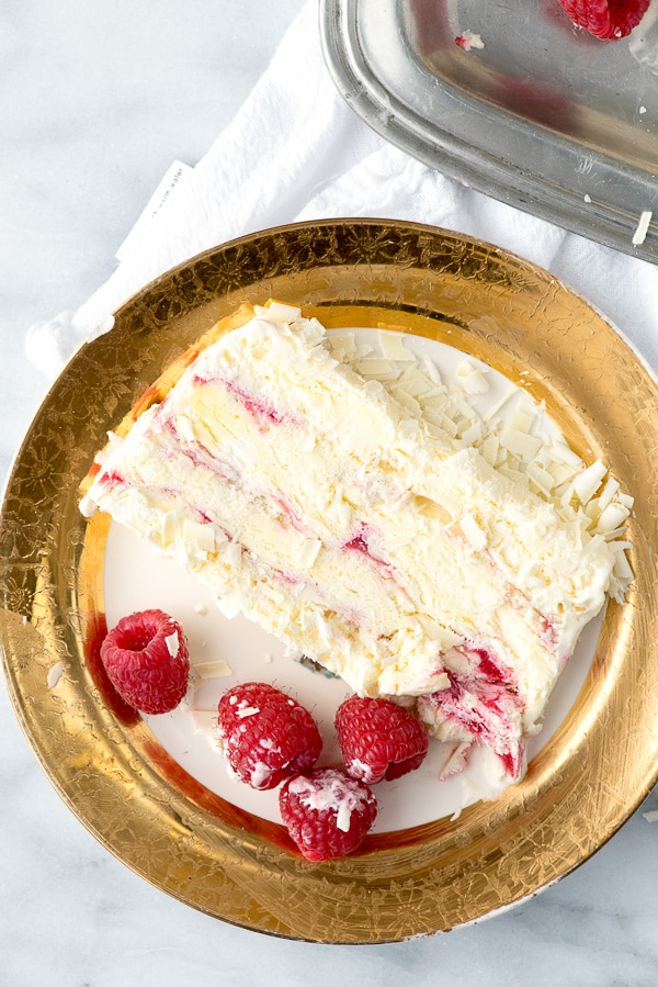 slice of White Chocolate Raspberry Semifreddo with raspberries