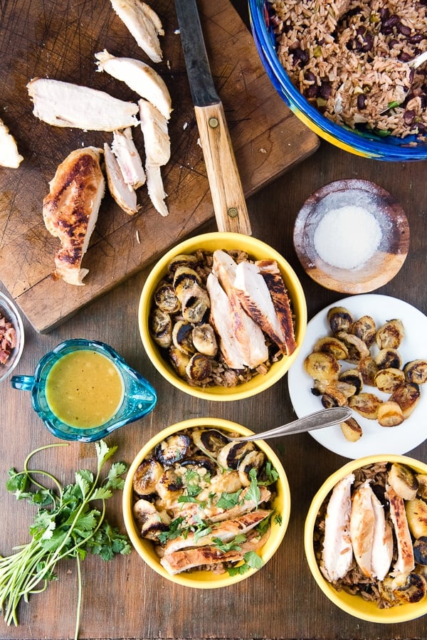 yellow bowls with ingredients needed to make Cuban Garlic Chicken Bowls