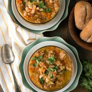 bowls of Slow Cooker Spicy Chorizo Green Chile Cannellini Bean Soup