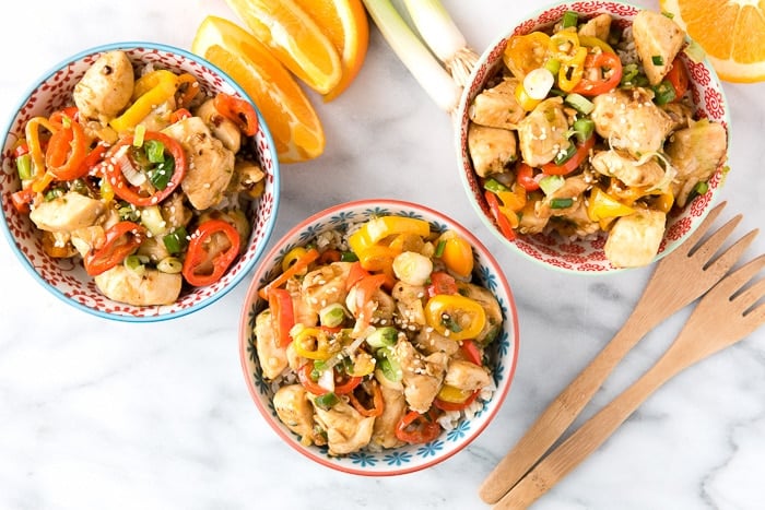 overhead shot of 3 bowls of Spicy Ginger Chicken Stir Fry