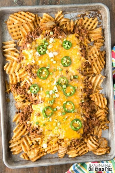sheet pan of Texas-Inspired Chili Cheese Fries.